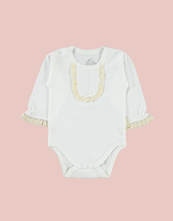 Our bodysuits feature a delightful frill collar and cuff detailing, adding a touch of whimsy to your baby's wardrobe. The intricate coloured embroidery on the ruffle collar lends a pop of color and personality, available in your choice of pink or beige